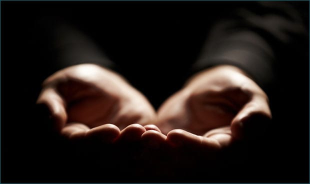Hands held open to display receptiveness to God